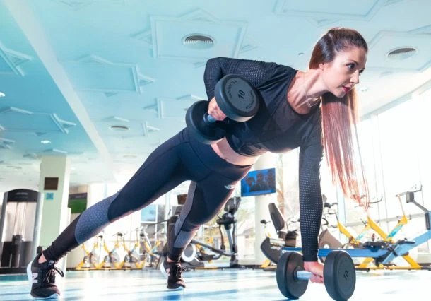 woman-doing-exercise-inside-gym-2247179-610x426-1